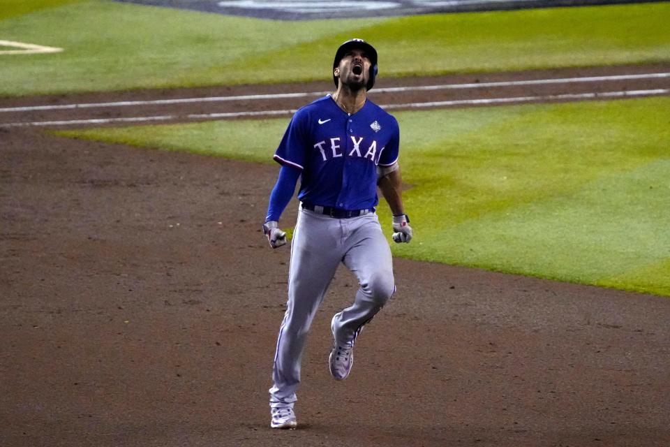 Marcus Semien celebrates his home run in Game 5 of the 2023 World Series.