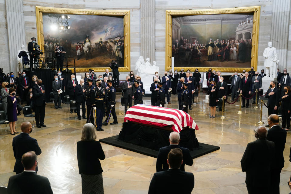 The casket of former Sen. Bob Dole of Kansas, in the Rotunda of the U.S. Capitol, where he will lie in state, Thursday, Dec. 9, 2021 in Washington. (Shawn Thew/Pool via AP)