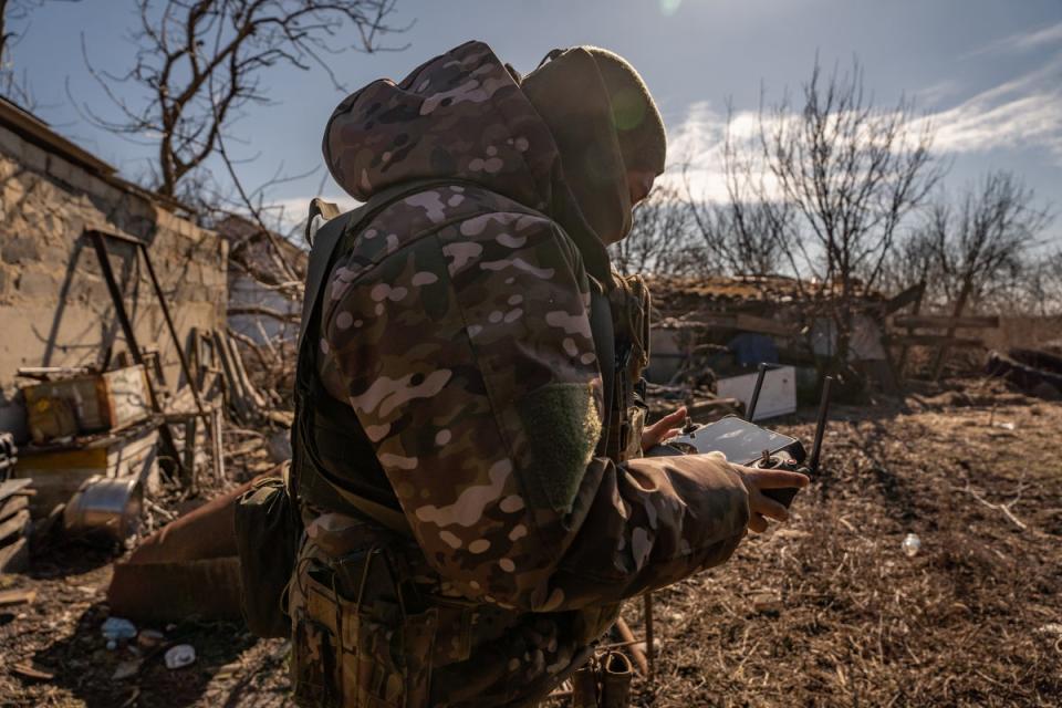 A Ukrainian drone operator surveys Russian movement just a few hundred metres from their positions (Bel Trew)