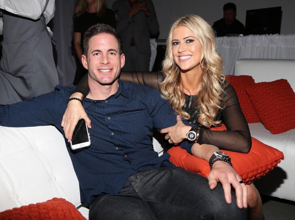 Tarek El Moussa and Christina Haack pose for a photo.