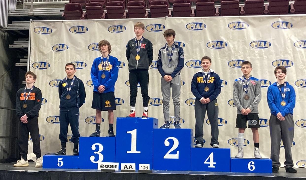 Hickory's Louie Gill stands atop the 106-pound medal stand after winning the PIAA Class 2A championship as a freshman on Friday, March 12, 2021.