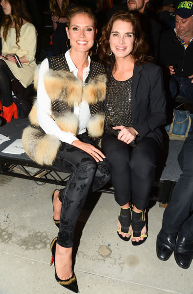 <b>Heidi Klum and Brooke Shields </b><br><br>The German-born supermodel joined the actress at the Kenneth Cole show wearing a fur lined gilet, floral print trousers and pointed heels.<br><br>Image © Rex