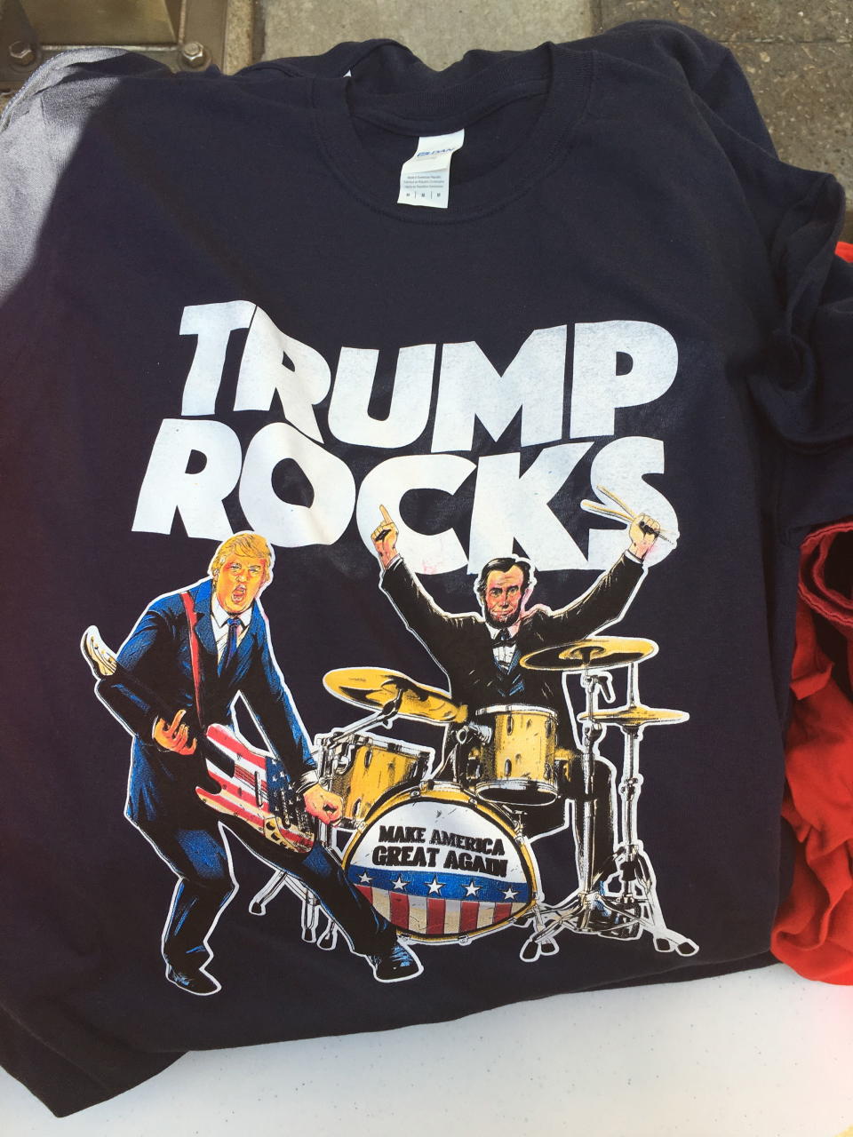 <p>In this scenario, Honest Abe is relegated to drum duty while Donald shreds on the Ameriguitar.</p>