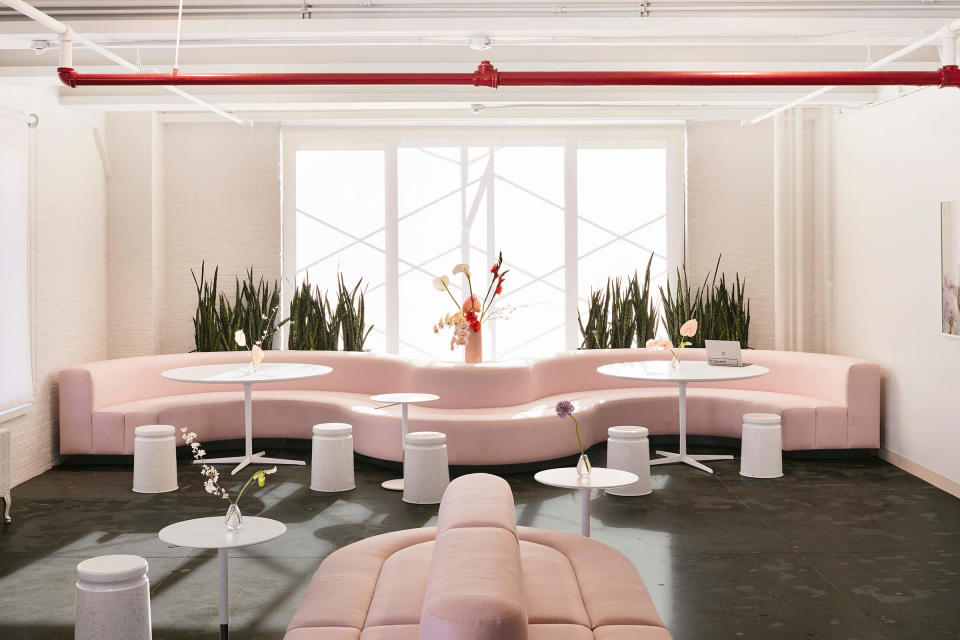 A seating area inside Glossier’s HQ in New York City designed by Rafael de Cárdenas in 2018.