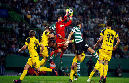 Football Soccer - Sporting Lisbon v Borussia Dortmund - Champions League - Group F - Alvalade stadium, Lisbon, Portugal - 18/10/16 Borussia goalkeeper Roman Burki saves the ball. REUTERS/Rafael Marchante