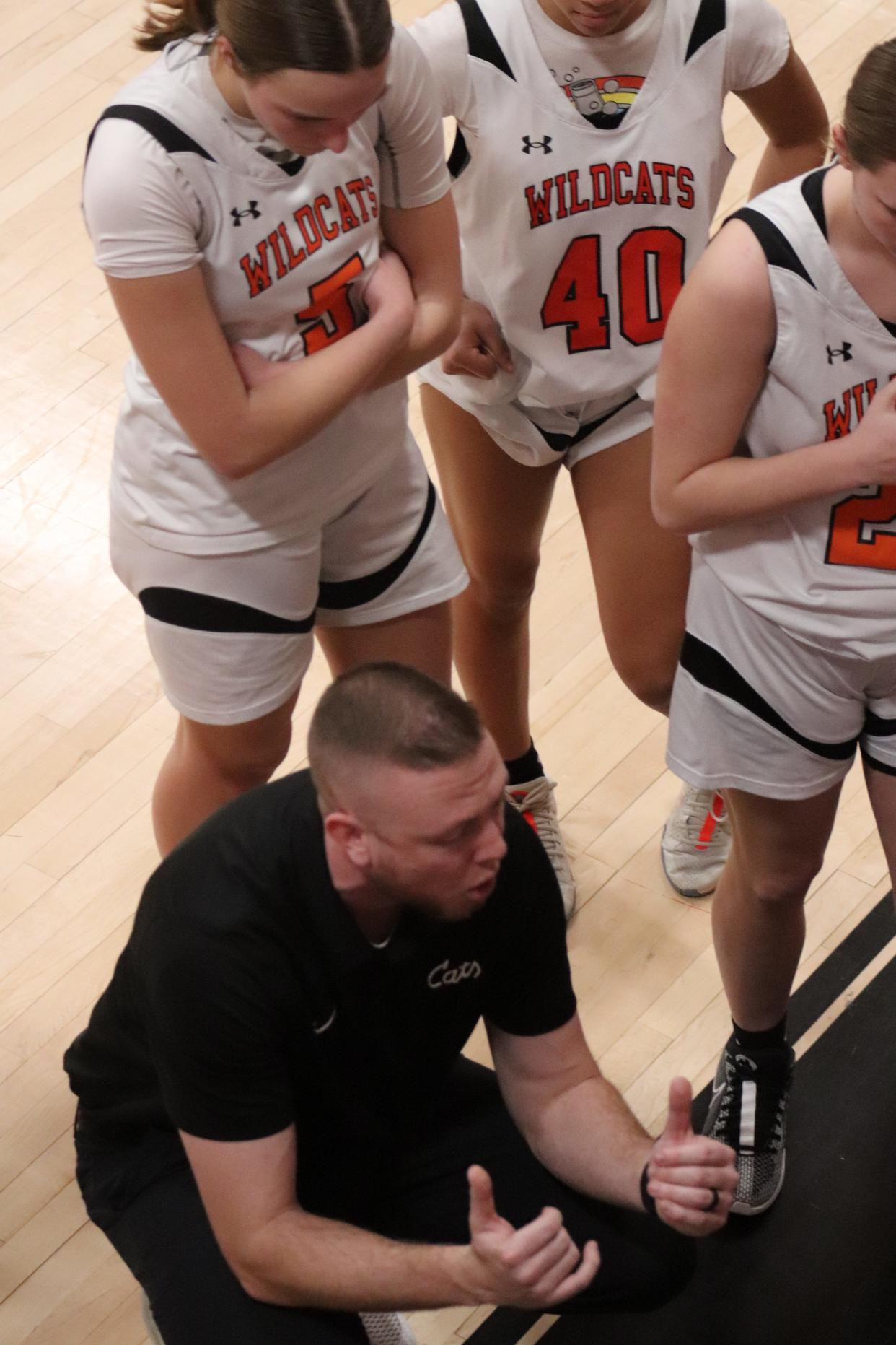 Gardner coach Francis Phillips instructs his players during a timeout in the opening tournament game against South Lancaster Academy on February 26, 2024.