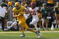 Baylor tight end Ben Sims (86) runs for a touchdown past Iowa State defensive back Anthony Johnson Jr. (26) after a catch during the first half of an NCAA college football game, Saturday, Sept. 25, 2021, in Waco, Texas. (AP Photo/Jim Cowsert)