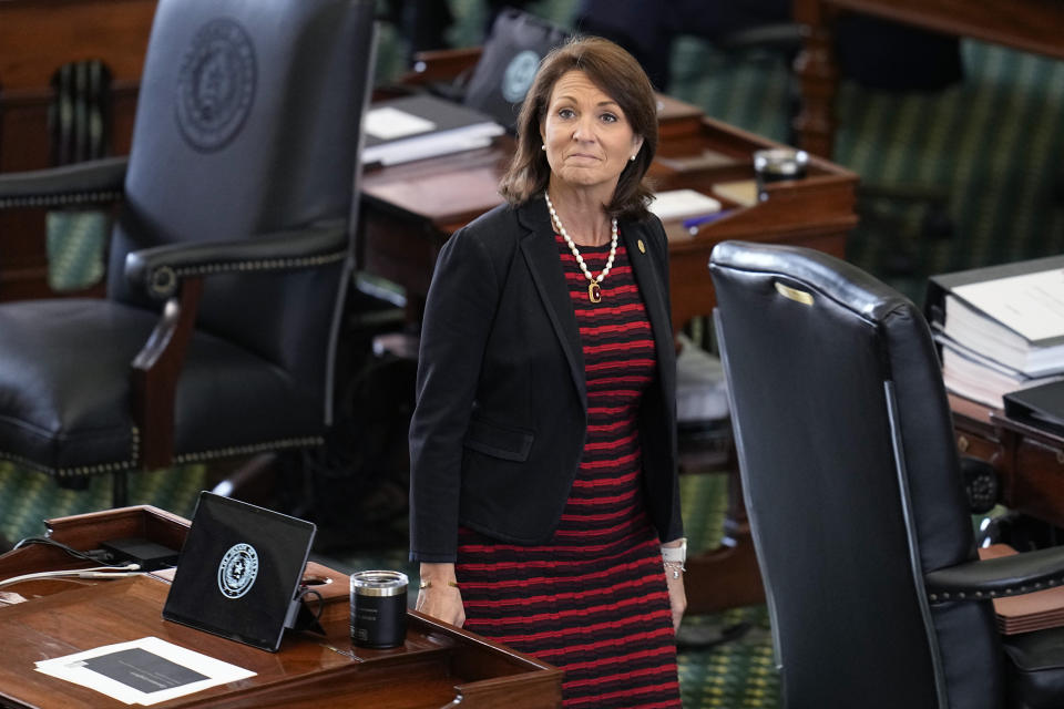 Texas state Sen. Angela Paxton, R-McKinney, wife of suspended Texas state Attorney General Ken Paxton, walks through the Senate Chamber during the impeachment trial for her husband at the Texas Capitol, Saturday, Sept. 16, 2023, in Austin, Texas. (AP Photo/Eric Gay)