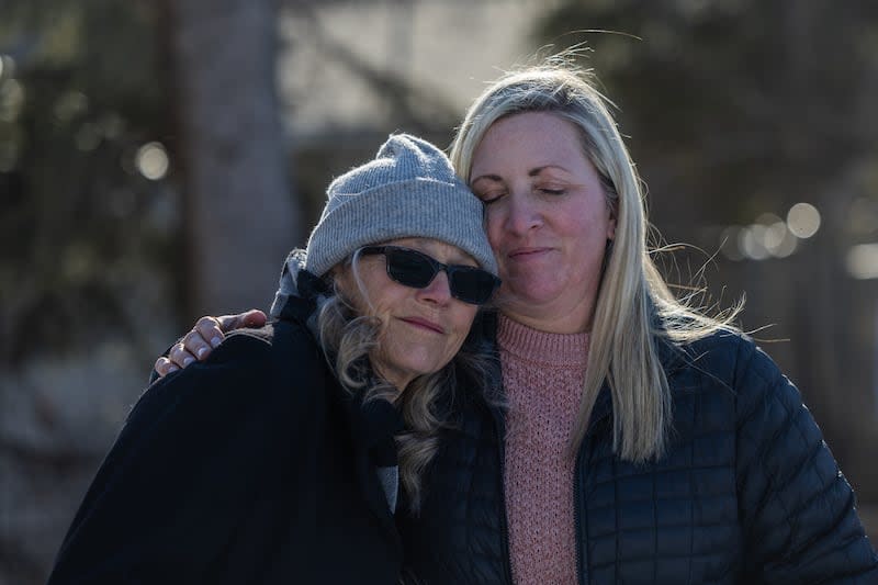 Ann Marie Herpich, left, sister to Jordan Rasmussen, hugs Lisa Rasmussen Opfar, Jordan’s daughter, at Wasatch Lawn Memorial Park and Mortuary in Millcreek on March 5, 2023. | Ryan Sun, Deseret News