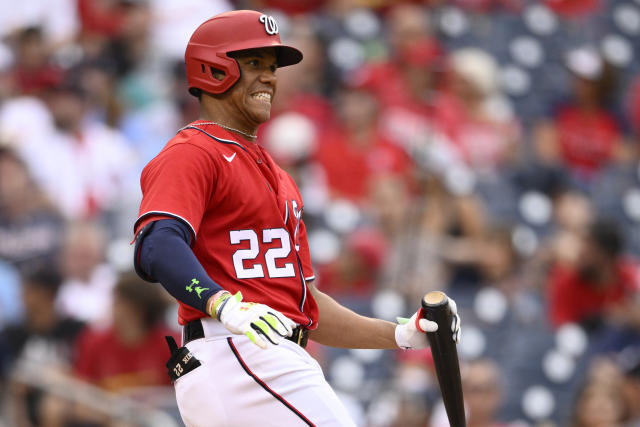 Washington Nationals' Juan Soto, front, stands in the dugout before a  baseball game against the Kansas City Royals, Saturday, July 6, 2019, in  Washington. The Nationals are paying tribute to the Montreal