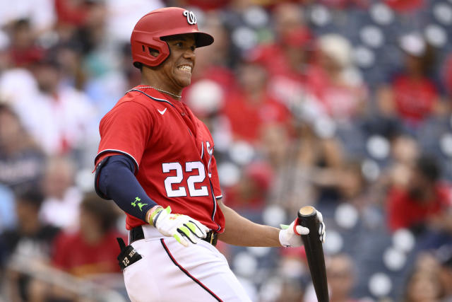 Washington Nationals' Juan Soto makes a running catch on a ball hit by St.  Louis Cardinals' Kol …