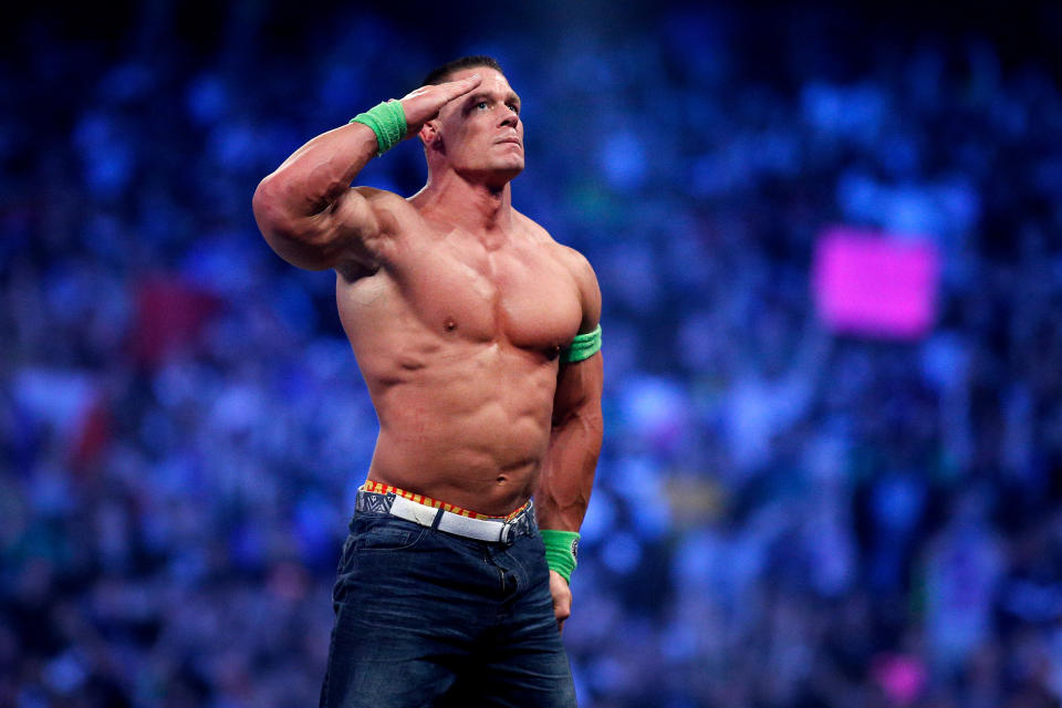 John Cena celebrates his win during Wrestlemania XXX at the Mercedes-Benz Super Dome in New Orleans on Sunday, April 6, 2014. (Jonathan Bachman/AP Images for WWE)