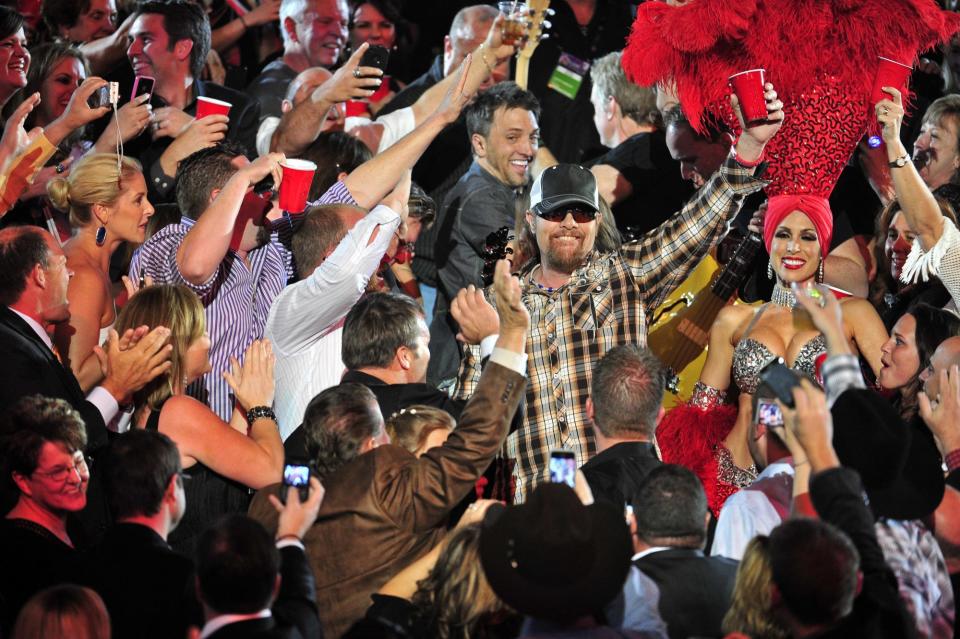 Toby Keith performs Red Solo Cup while walking through the stands at the ACM Awards at the MGM Grand April 1, 2012 in Las Vegas, Nev.