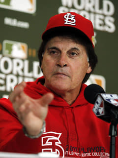 Cardinals manager Tony La Russa talks with reporters in St. Louis on the eve of Game 6 of the World Series