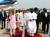 <p>Prince Charles and Camilla arrive in Abuja, their first stop in Nigeria. The couple announced that they will be cancelling their stop to Jos due to security concerns. </p>