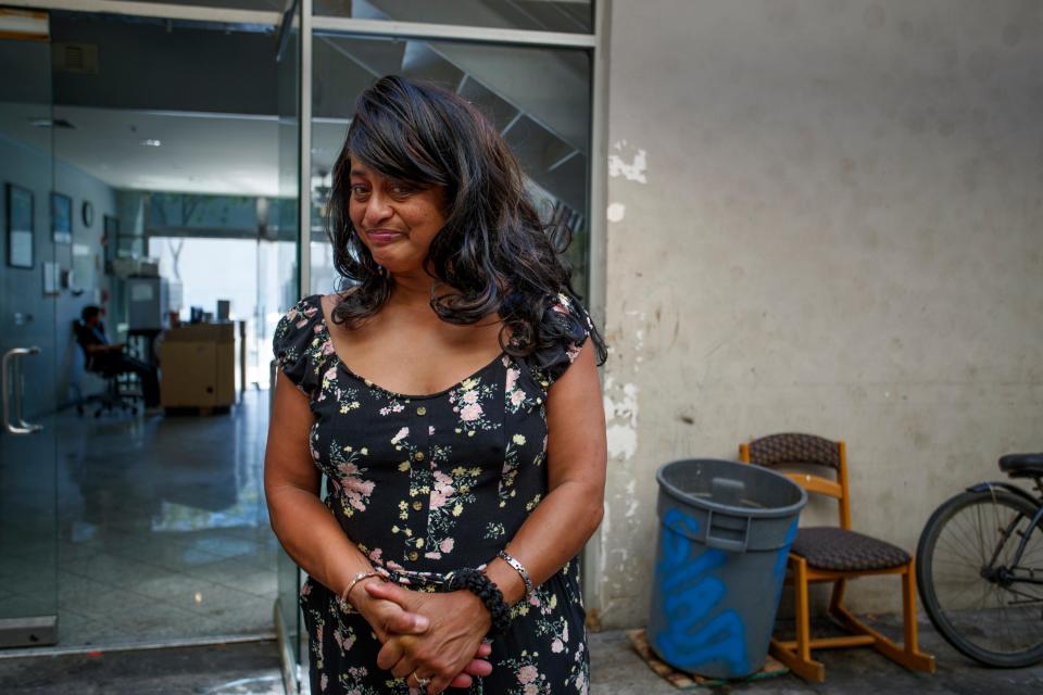 Brenda Flanagan pauses for a moment while talking about her friend and neighbor who died of a drug overdose inside the unpermitted housing complex in San Bernardino, Calif., on October 5, 2022.