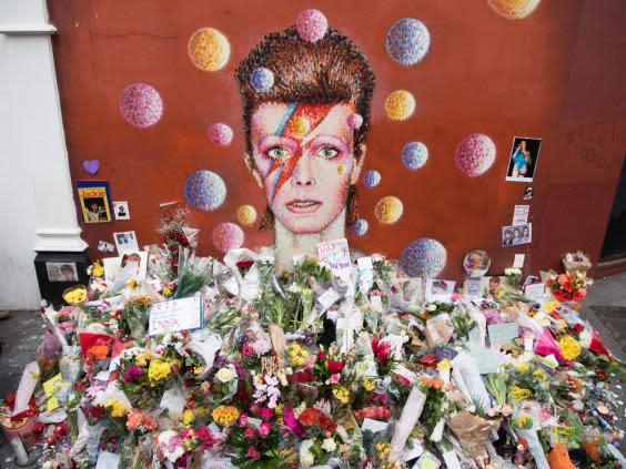 Mural of British singer David Bowie, painted by Australian street artist James Cochran, aka Jimmy C, Brixton, south London (AFP)