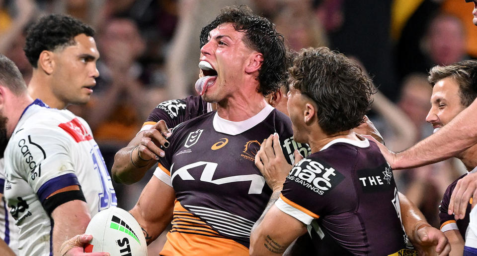 Broncos players celebrate during their emphatic NRL finals win over the Storm in week one. Pic: Getty
