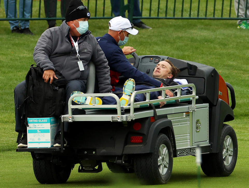 Tom Felton in a stretcher after collapsing at a celebrity event before the Ryder Cup