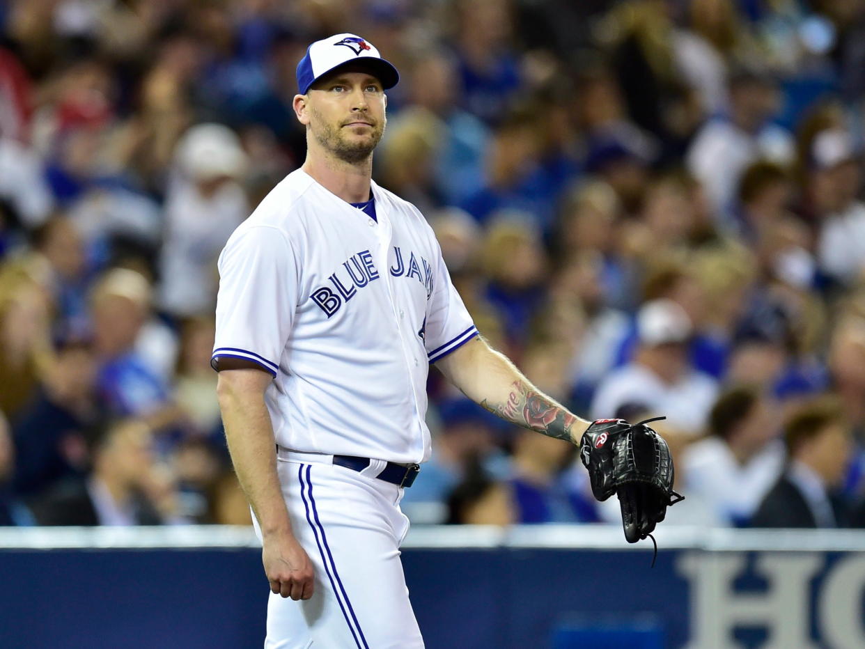 John Axford’s outreach to a couple that broke up near the Blue Jays bullpen on Friday has apparently gone unheeded. (AP)