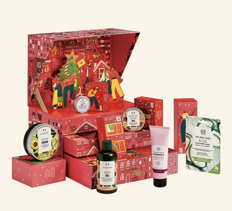The Body Shop Share the Love Big Advent Calendar in red box with christmas decor (Photo via The Body Shop)