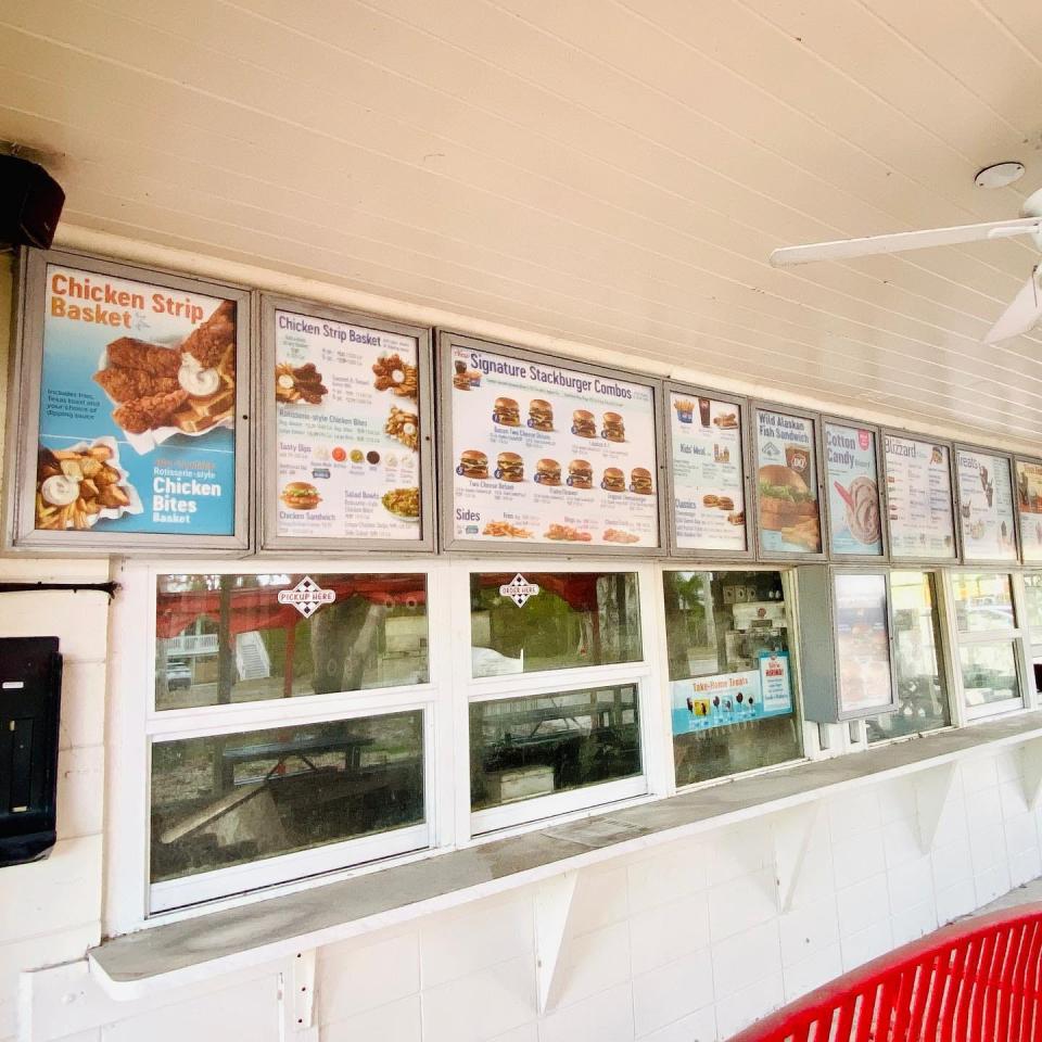 Frozen in time, the menu at the Sanibel Dairy Queen remains the same as it did right before Hurricane Ian struck in September. It's currently on the market for $2 million after sustaining hurricane damage from Ian.