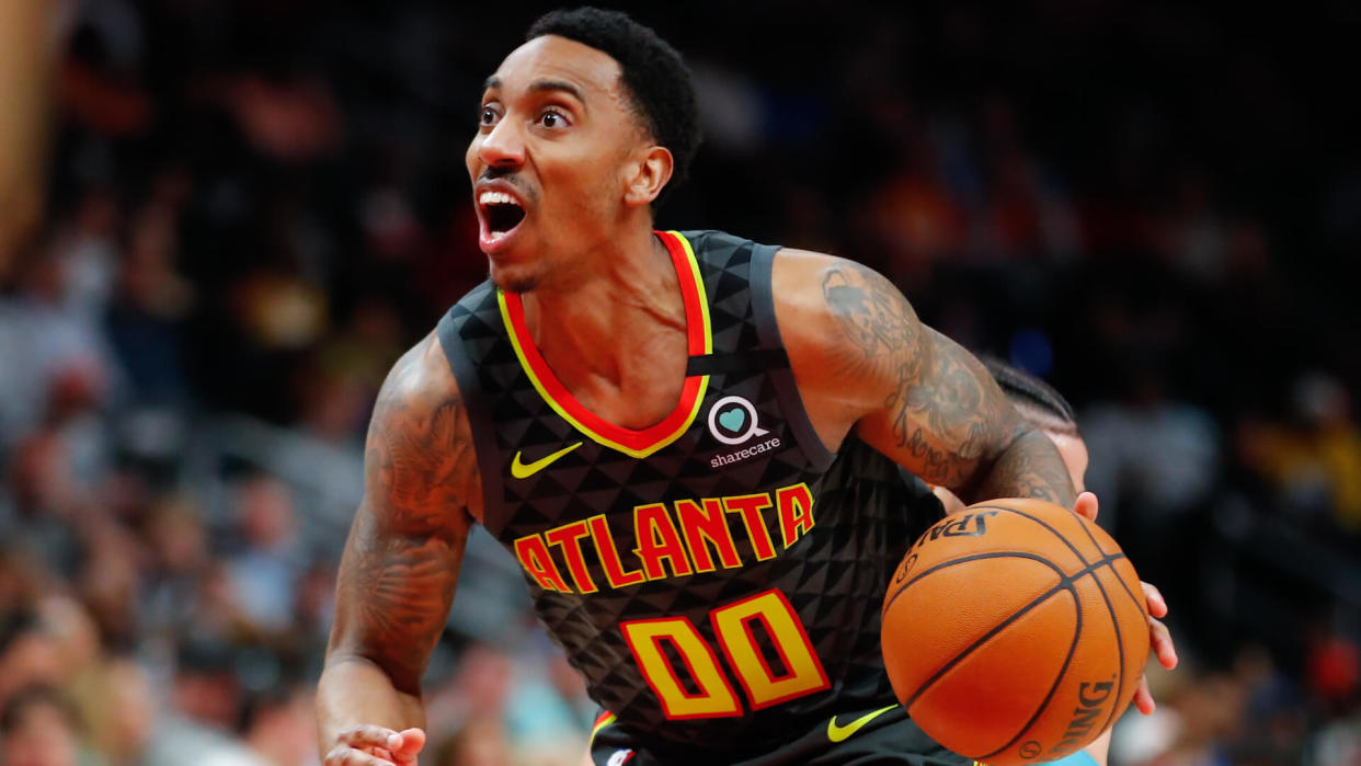 ATLANTA, GA - MARCH 09: Jeff Teague #00 of the Atlanta Hawks drives to the basket during the second half of an NBA game against the Charlotte Hornets at State Farm Arena on March 9, 2020 in Atlanta, Georgia.