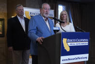 Former Arkansas Gov. Mike Huckabee, a Republican, speaks in support of the recall of Calif., Gov. Gavin Newsom Calif., Friday, July 30, 2021. Huckabee, flanked by former California Secretary of State Bill Jones, a Republican, and Anne Dunsmore, campaign manager of the pro-recall group Rescue California, attended a fund raising breakfast for the recall campaign. While Democratic registration almost doubles that of Republicans in the state, Democratic Party leaders fear Republicans appear more eager to vote in the Sept. 14 election. (AP Photo/Rich Pedroncelli))