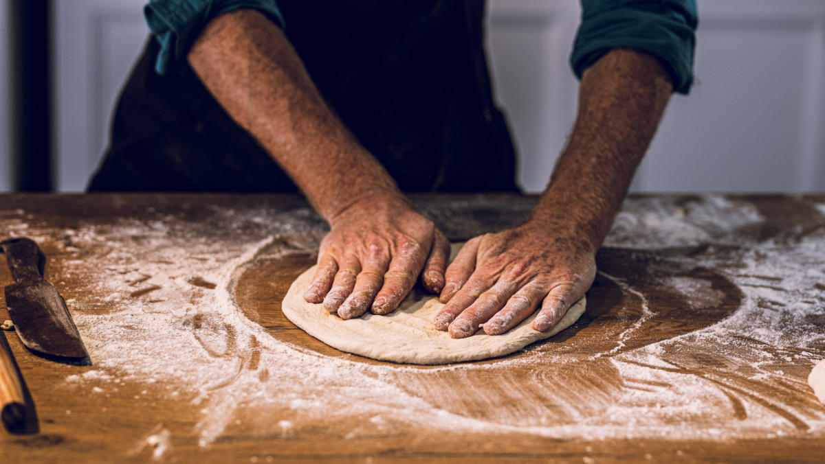 The Trick To Getting Your Pizza Off The Peel And Into The Oven