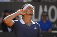 Germany's Alexander Zverev celebrates winning a set against Chile's Alejandro Tabilo during a men's tennis semifinal match at the Italian Open tennis tournament, in Rome, Friday, May 17, 2024. (AP Photo/Andrew Medichini)