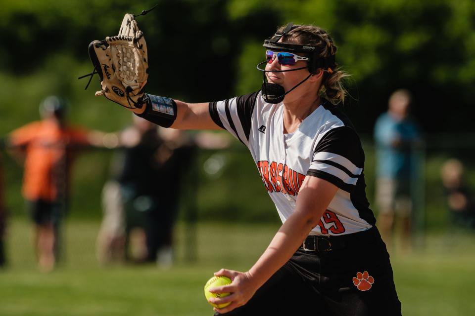 Strasburg's Amelia Spidell makes a delivery during the Division IV District Final game against Conotton Valley.