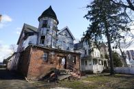 The location of a future construction site of affordable housing is shown Tuesday, Dec. 29, 2020, in Stamford, Conn. With many New Yorkers moving to neighboring Connecticut during the pandemic, especially Fairfield County, it's becoming more challenging for people to find affordable homes to buy. (AP Photo/Frank Franklin II)