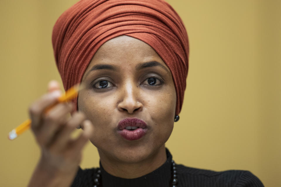 FILE - Rep. Ilhan Omar, D-Minn., speaks to witnesses during a House Committee on the Judiciary‚ Subcommittee on Immigration and Citizenship and Committee on Foreign Affairs, Subcommittee on Oversight and Investigations joint hearing on the administration's 'Muslim ban' on Capitol Hill in Washington Sept. 24, 2019. (AP Photo/Manuel Balce Ceneta File)