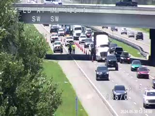 Truck hauling crane hits Enterprise Road overpass at I-4, backing up ...