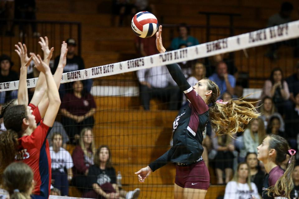 Flour Bluff's Maggie Croft tips the ball during the Veterans Memorial game at Flour Bluff High School on Tuesday, Oct. 4, 2022.