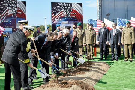 Officials take part in the official ground-breaking ceremony of a NATO ballistic missile defence facility in Redzikowo near Slupsk, Poland May 13, 2016. Agencja Gazeta/Jan Rusek via REUTERS