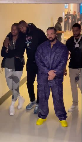 <p>cryptocomarena/Instagram</p> LeBron James and Son Bronny Leave with Drake After Rapper's Los Angeles Concert