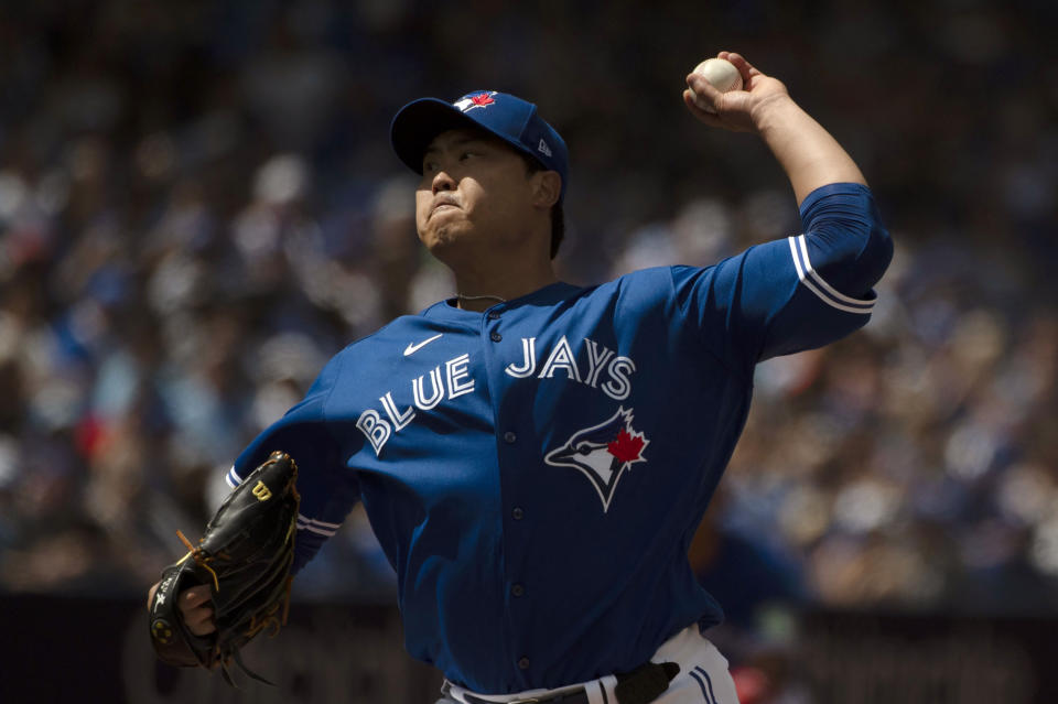 Toronto Blue Jays starting pitcher Hyun-Jin Ryu throws to a Chicago Cubs batter in second-inning baseball game action in Toronto, Sunday, Aug. 13, 2023. (Jon Blacker/The Canadian Press via AP)