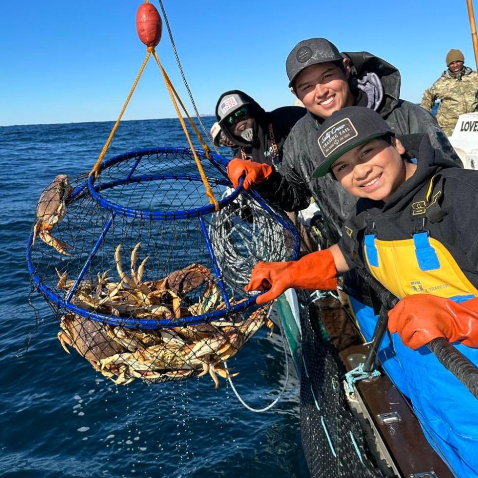 Anglers fishing outside the Golden Gate bring in a hoop net filled with Dungeness crabs during a recent trip.