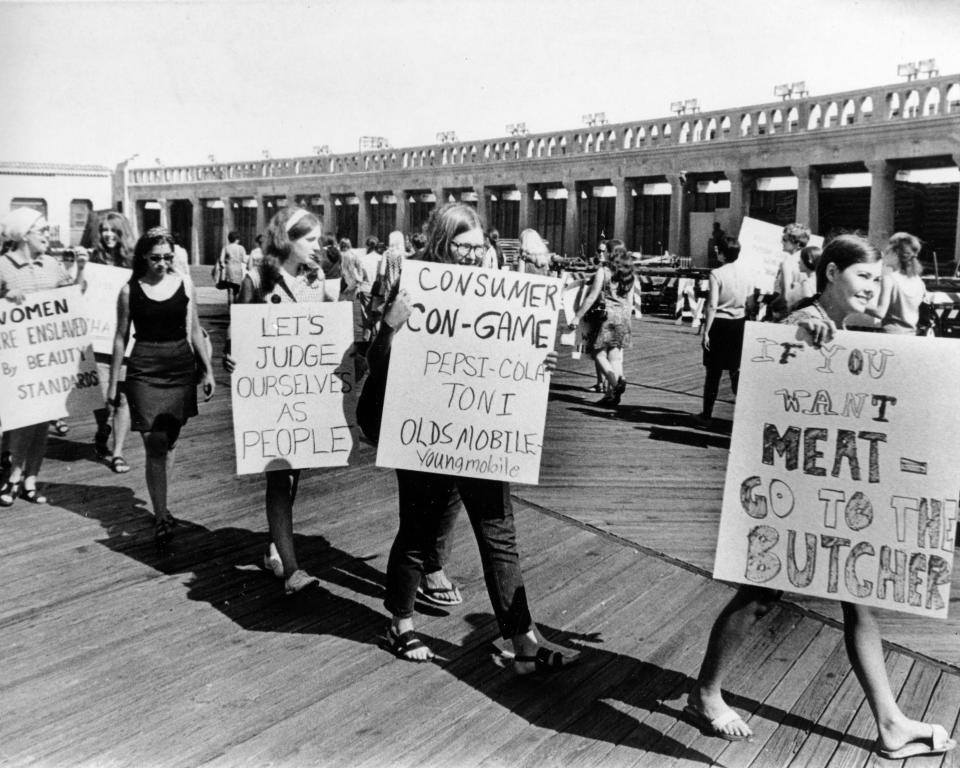 Demonstrators from the National Women's Liberation Party picket with signs in protest of the annual Miss America Pageant in front of the Convention Hall in Atlantic City, N.J., on Sept. 7, 1968. 