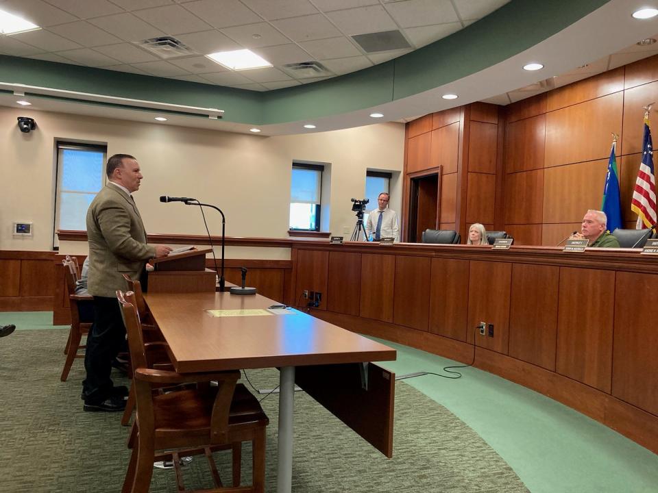 Erie County resident Larry Sapienza, on left, appears before Erie County Council on Aug. 9, 2023, to discuss his background and experiences. Sapienza is applying to fill the vacancy left by former County Councilmember Mary Rennie.