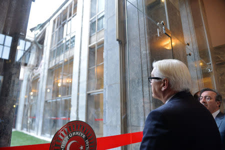 German Foreign Minister Frank-Walter Steinmeier visits Turkish Parliament which was partly damaged during the July 15 coup attempt, in Ankara, Turkey November 15, 2016. REUTERS/Stringer