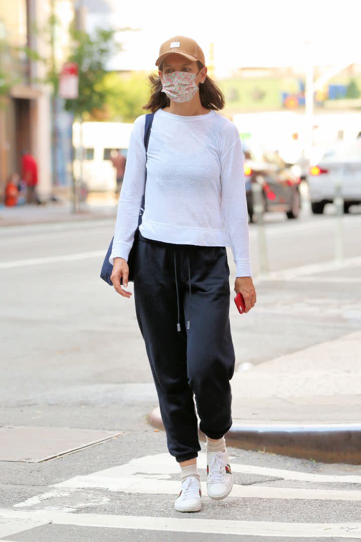 Katie Holmes returns a Citi Bike after a ride in New York City, June 29. - Credit: Christopher Peterson/Splash News