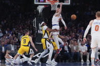 New York Knicks center Isaiah Hartenstein loses the ball during the first half of Game 7 in an NBA basketball second-round playoff series against the Indiana Pacers, Sunday, May 19, 2024, in New York. (AP Photo/Julia Nikhinson)