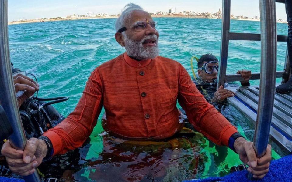 The Indian PM wore traditional orange attire for his dive in Dwarka in Gujarat, India