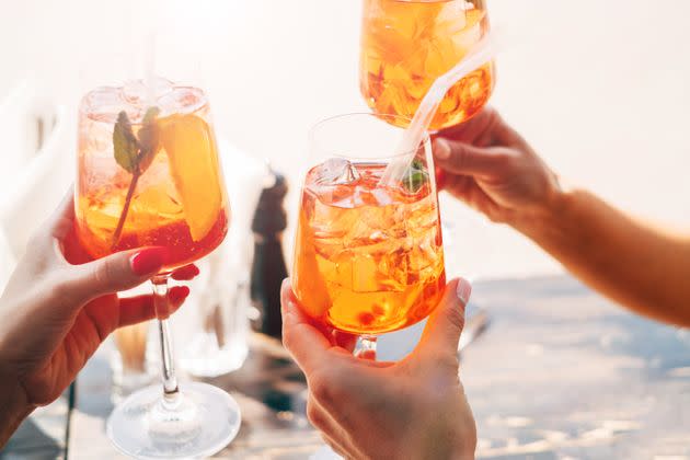 Think about the amount of sugar in an Aperol spritz vs. the old fashioned you might order at night. There's a lot more of it. (Photo: Alexey Dulin / EyeEm via Getty Images)