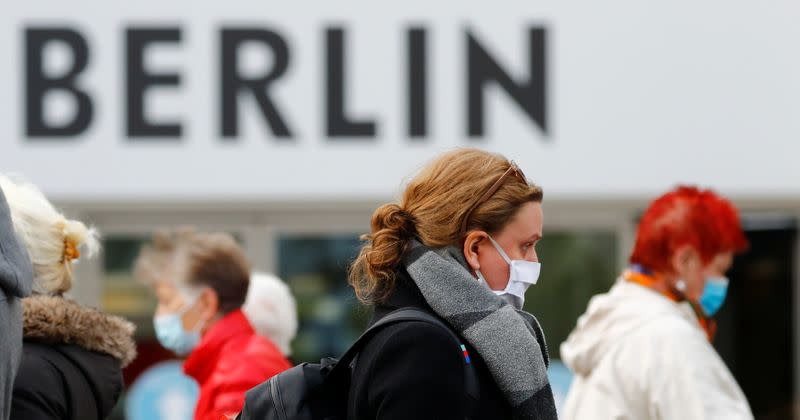 People wearing face masks are pictured at Schloss Strasse shopping street as the coronavirus disease (COVID-19) outbreak continues in Berlin