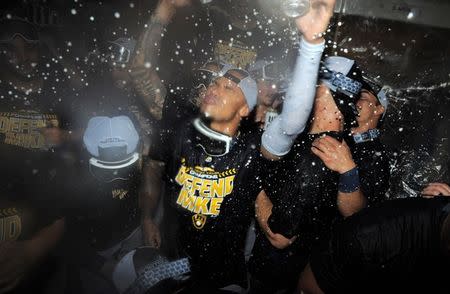 Oct 1, 2018; Chicago, IL, USA; Milwaukee Brewers shortstop Orlando Arcia (3) celebrates after defeating the Chicago Cubs in the National League Central division tiebreaker game at Wrigley Field. Mandatory Credit: Patrick Gorski-USA TODAY Sports