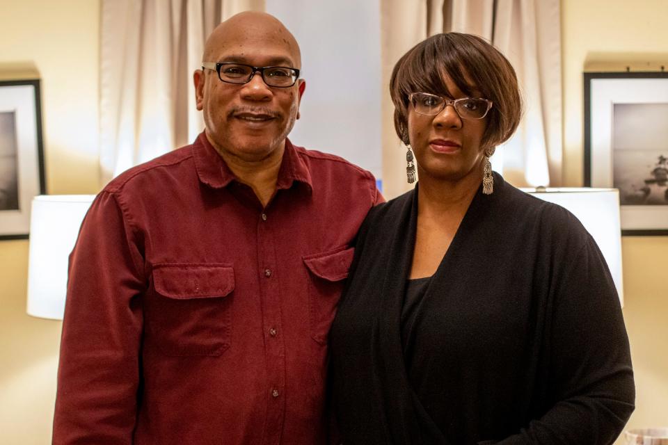 Frank McGhee, 59, left, and Kelly McGhee, 60, pose in February for a photo at their home in Detroit.