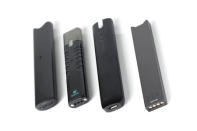 An electronic cigarette device made by JUUL (R) is shown next to other similar devices (L to R) Vuse Alto, Suorin ishare and myblu in this photo illustration taken September 20, 2018. REUTERS/Mike Blake/Illustration